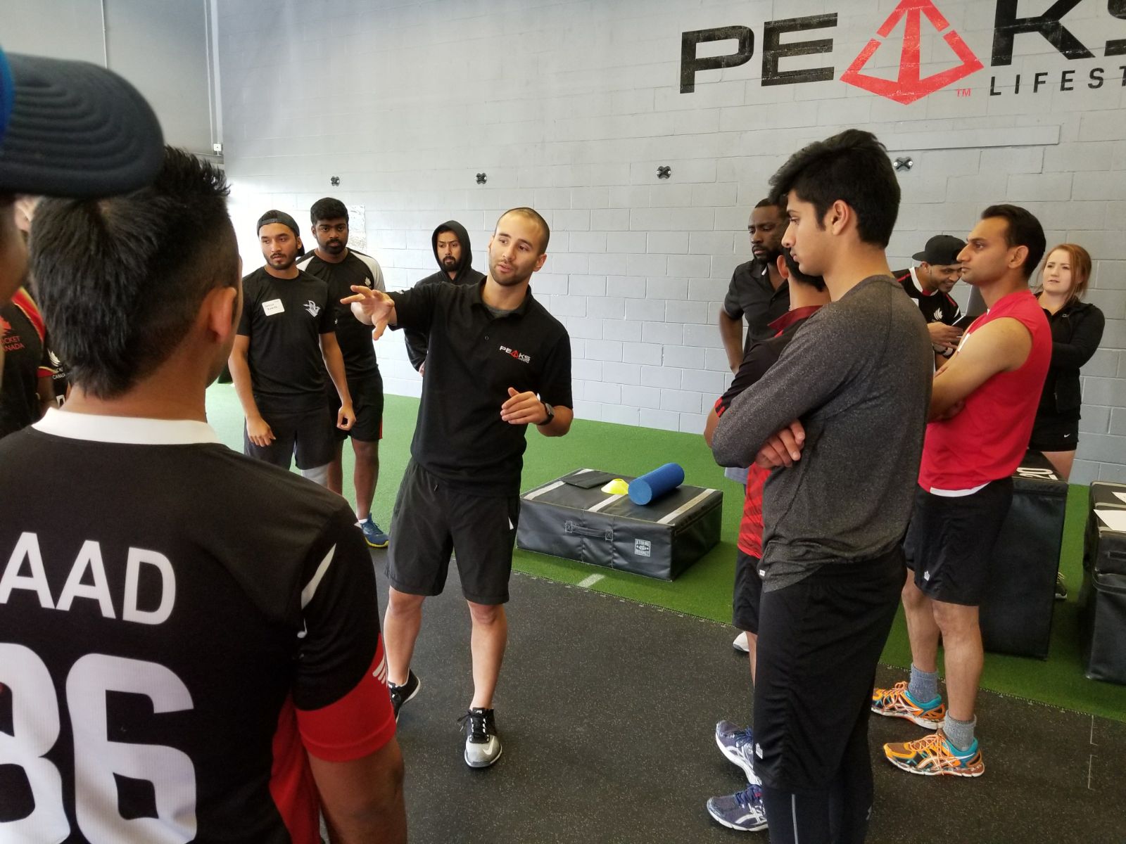 Adrian leading and coaching a group